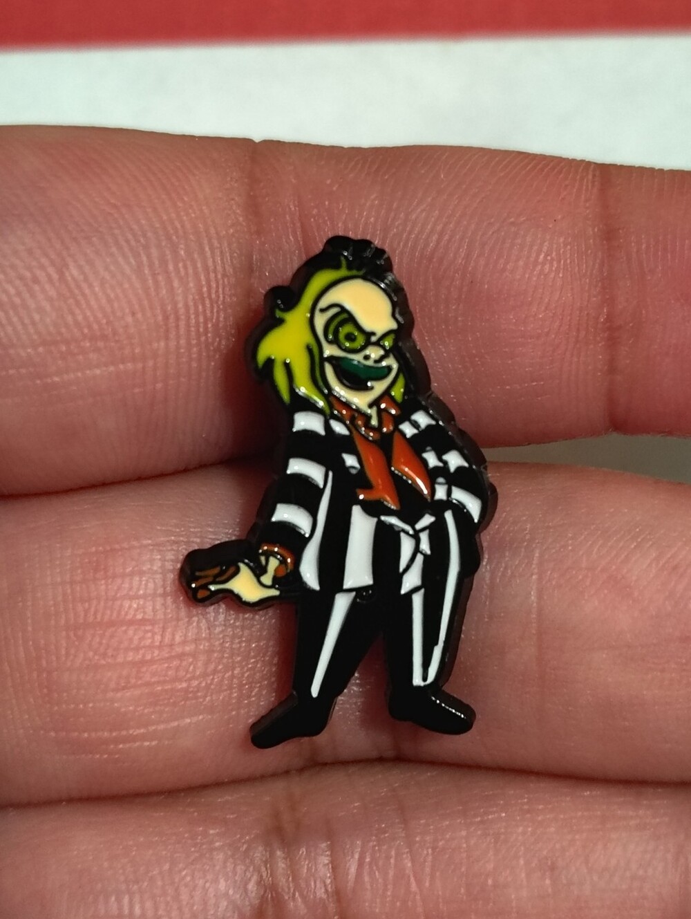 Beetlejuice Enamel Lapel Pin - Black, White & Yellow